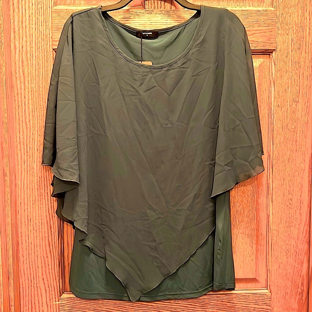 Lotusmile Woman’s top
NWT